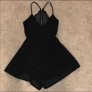 Black romper with lace back detail